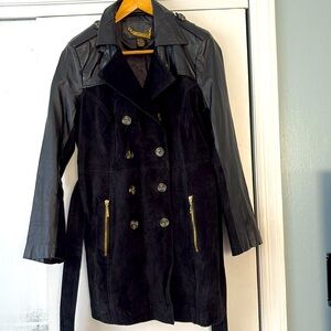 Iman beautiful genuine black leather trench coat.